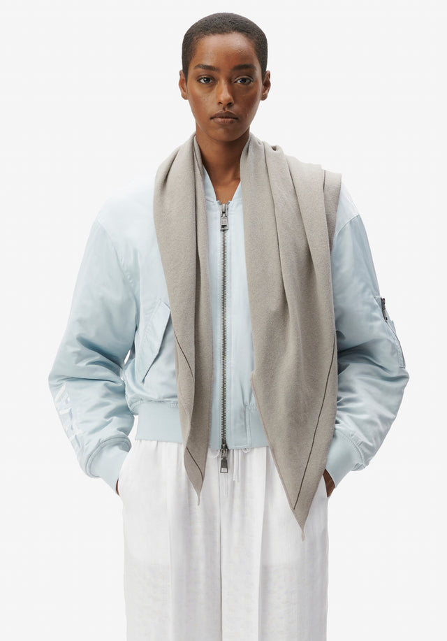 Triangle Solid M stone - An ultra-soft cashmere scarf with a subtle logo. The solid...
