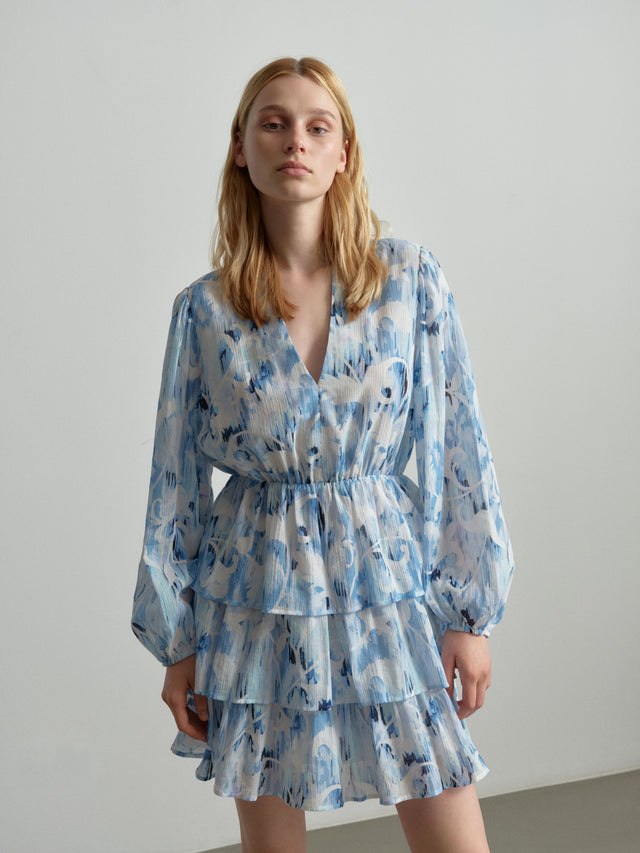 Dress Danuta floral fountain blue - Meet Danuta, the essential minidress designed with meticulous attention to...
