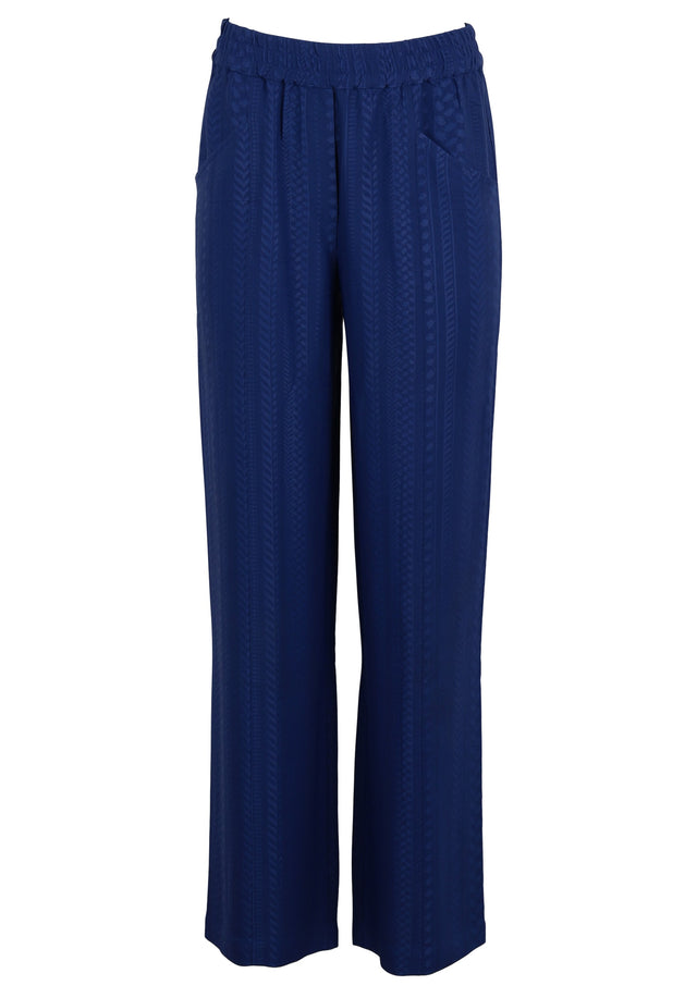 Pre-loved Pants Puffy - S Kufiya Jaquard Blue - Feeling as relaxed as they look. Pants Puffy, showing off...
