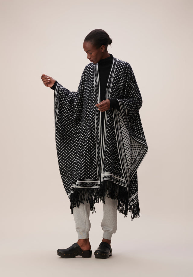 Poncho Trinity Classic Nero Alabastro - A luxurious cashmere poncho with a jaquard pattern in black... - 1/9