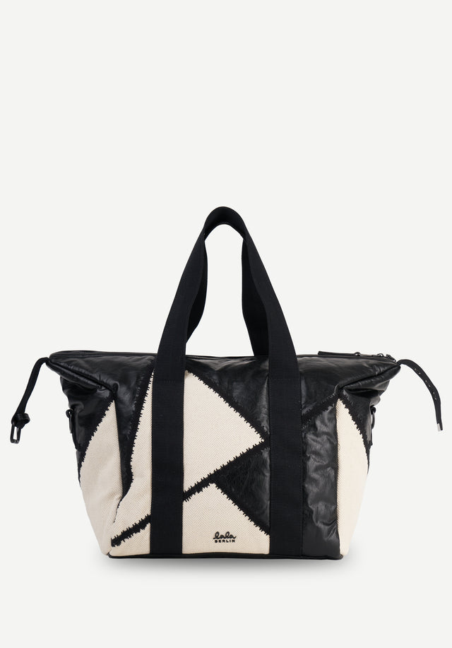 Weekender Maze dark egret black - A play on material combinations and haptics sits at the...
